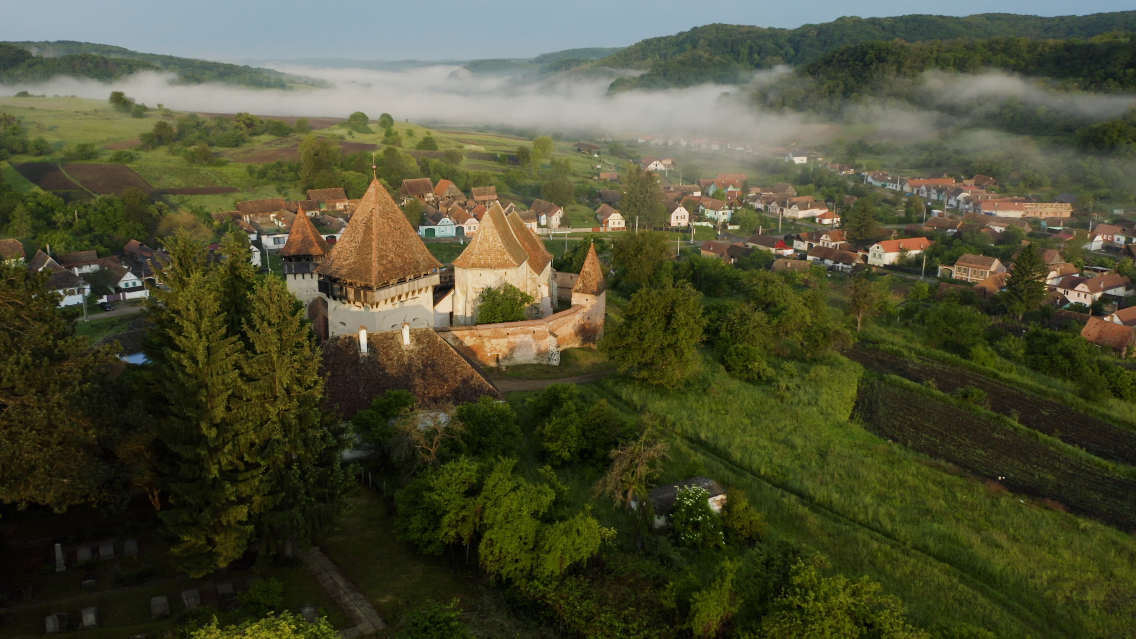 Fortified church above a Transylvanian village